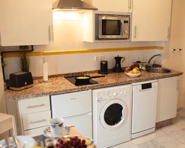 logo apartamentos turisticos